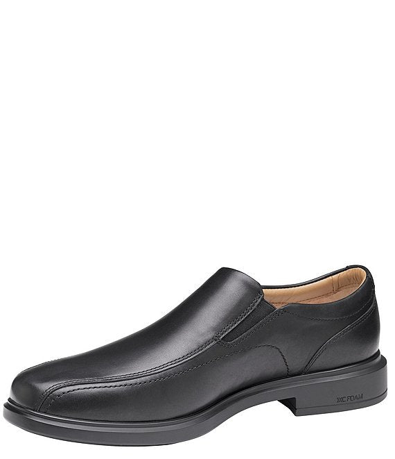 Johnston & Murphy XC4 Stanton 2.0 Waterproof Run-Off Slip-On shoes in black leather with sleek stitching, side angle view.