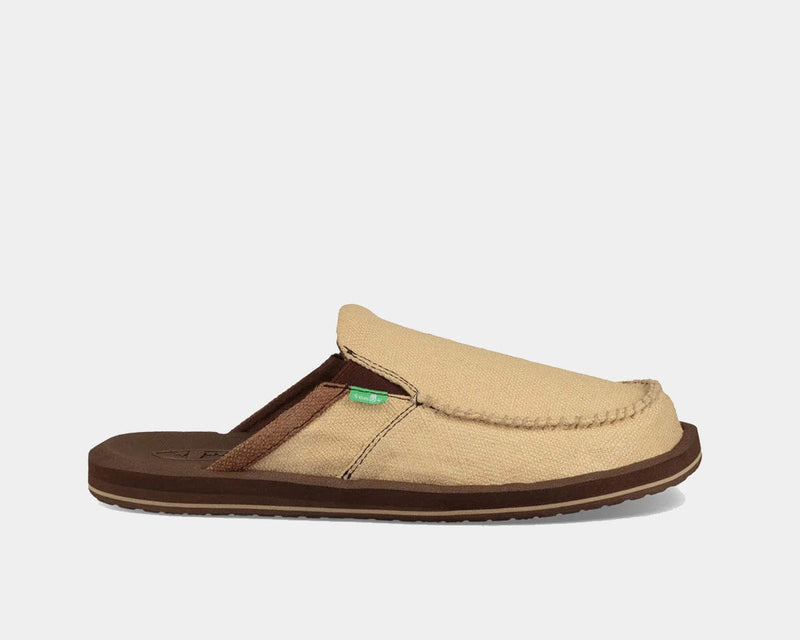 Sanuk You Got My Back III slip-on sandals in tan canvas with brown sole and stitched detailing, side view.
