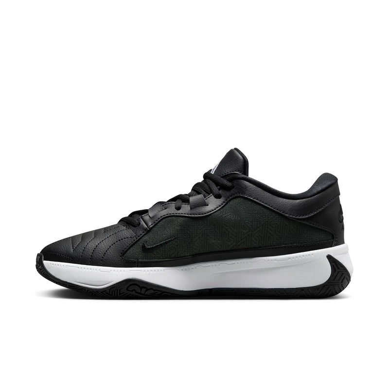 Nike Zoom Freak 5 basketball shoes in black and dark green with textured upper, cushioned midsole, and rubber outsole, side view.